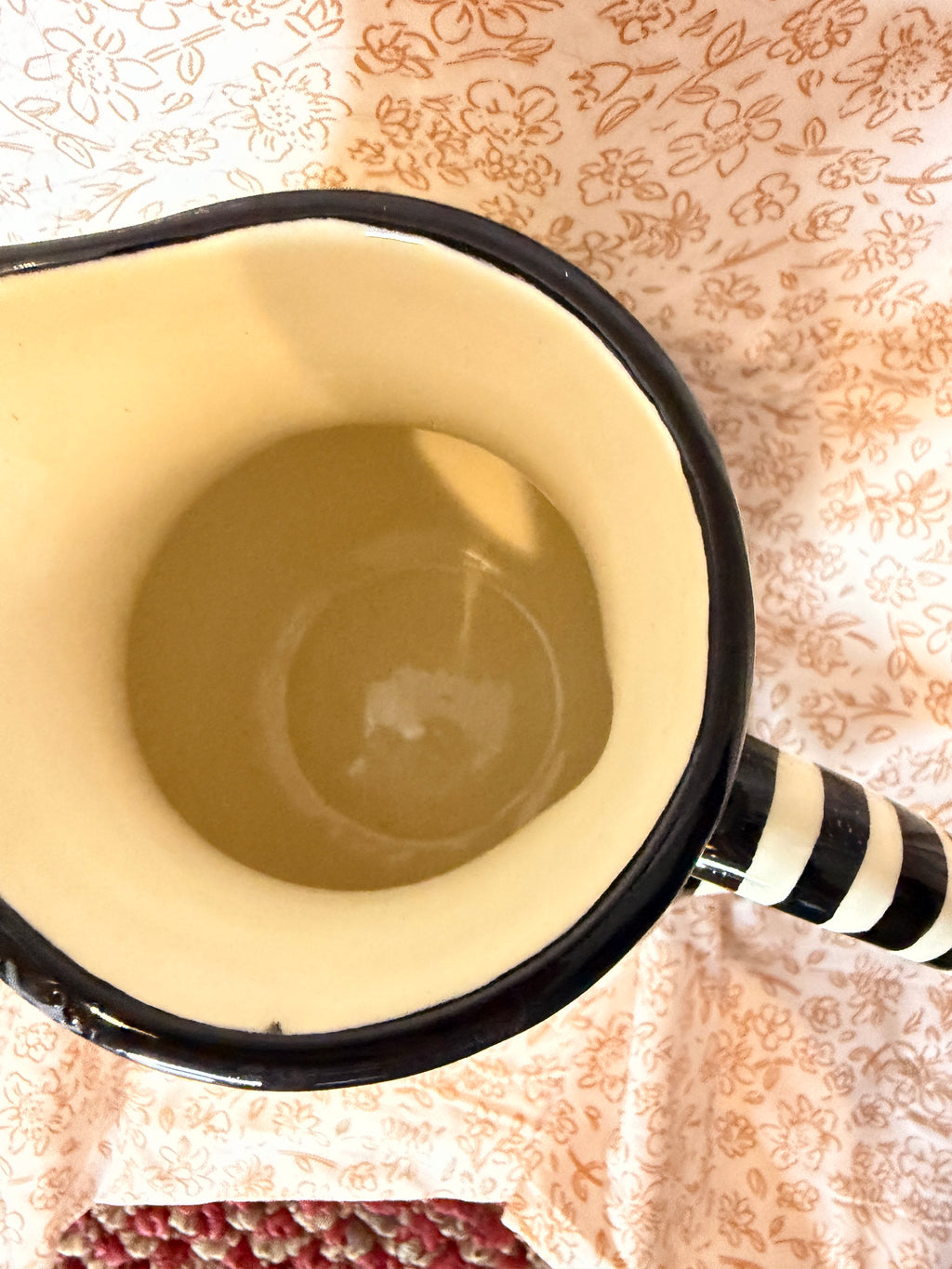 Vintage Pier 1 Imports Hand Painted Floral Ceramic Pitcher with Black & White Striped Handle